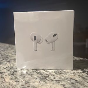 Brand new still in plastic AirPods Pro…. Newest ones with MagSafe charging case